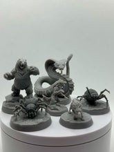 Load image into Gallery viewer, May include: A collection of gray miniature fantasy creatures, including a bear, a cobra, a werewolf, a wolf, and two spiders. Each figure is mounted on a circular base, suitable for tabletop gaming or display.
